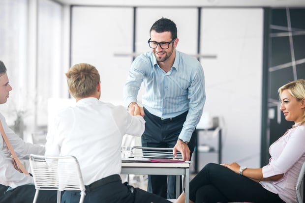 Business people shaking hands on a company meeting-1