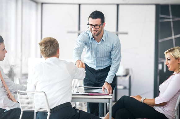 Business people shaking hands on a company meeting