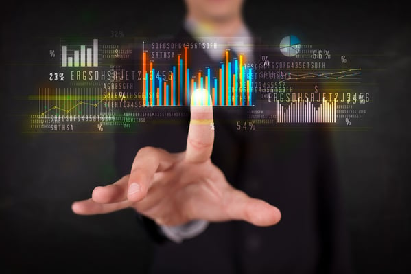 Business person touching colorful charts and diagrams