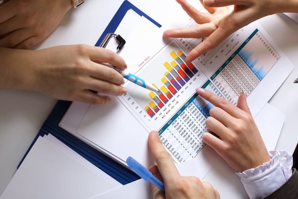 Financial paper charts and graphs on the table-1